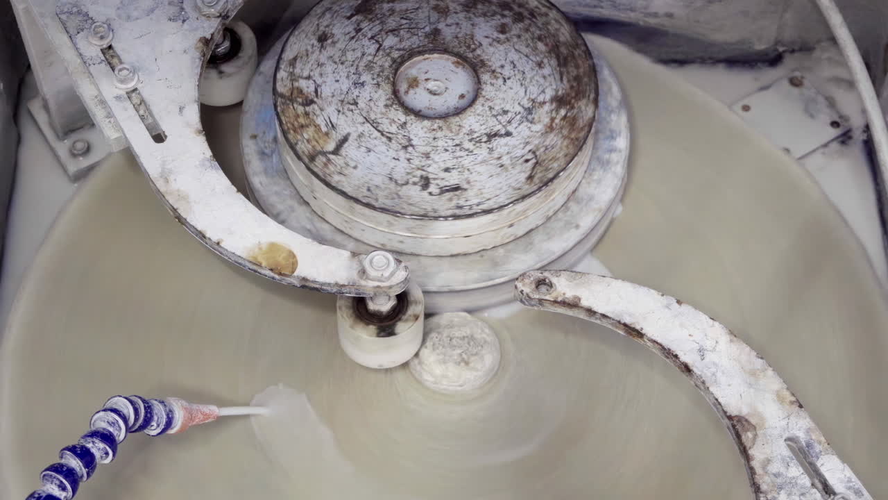 Close up of a white, spinning art installation