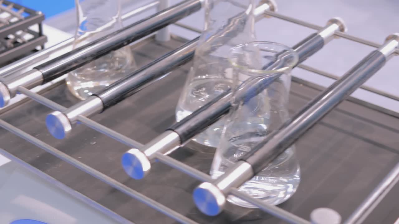 Orbital shaker for mixing, shaking, blending biological samples in glass vials