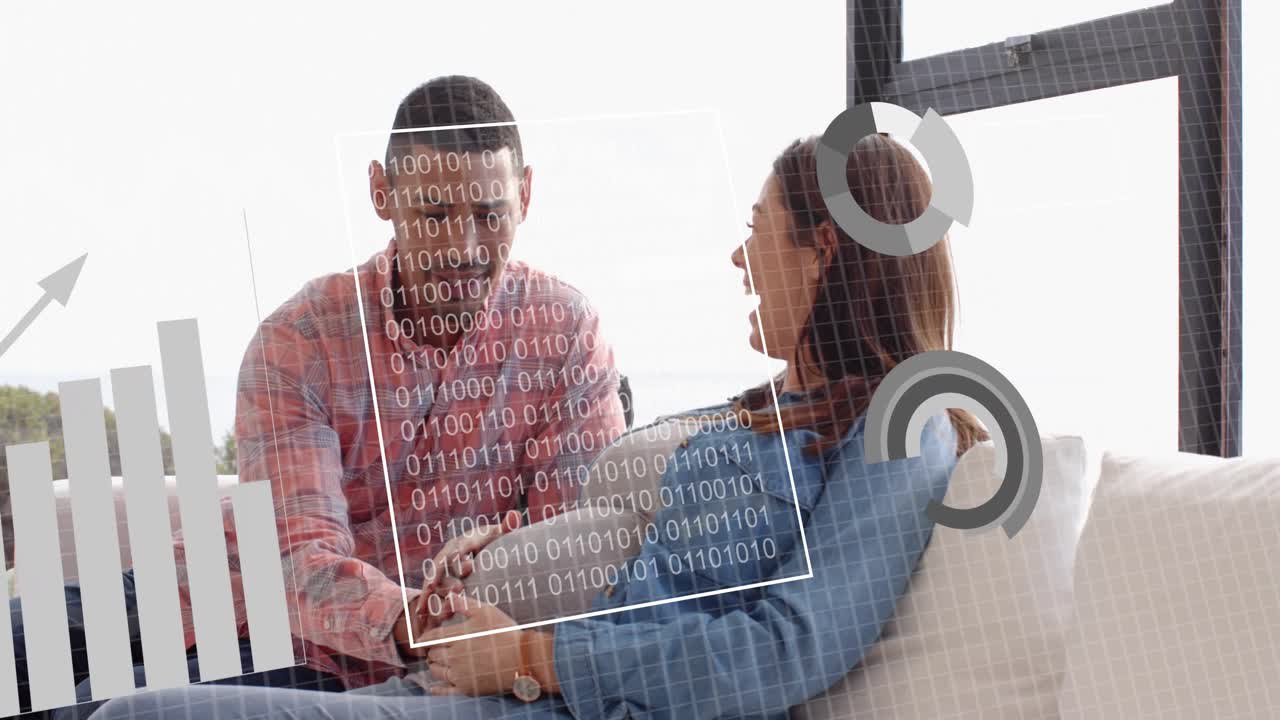 Man and woman leaning on sofa, tapping projected panel with binary rings, reviewing tech data