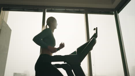 Gym,-window-or-person-running-on-treadmill-machine