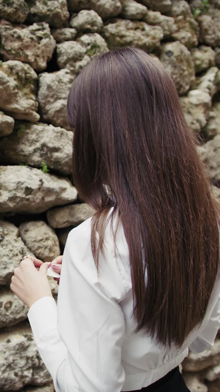 Woman Reading A Prayer In Front Of The Sacred Old Wall