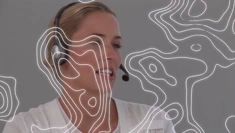 Animation-of-moving-lines-over-woman-wearing-phone-headset