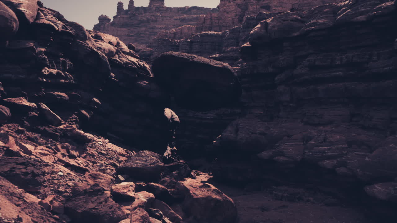 Golden illuminated gorge showcasing complex stratified geological features
