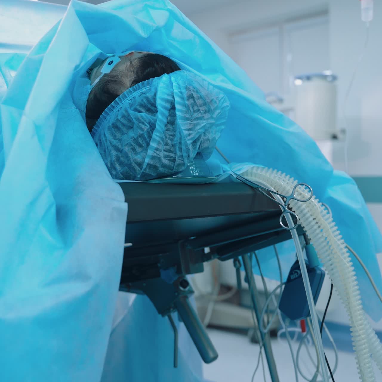 In surgery. Medical team performing operation in hospital operating theater. Working with surgical instruments.