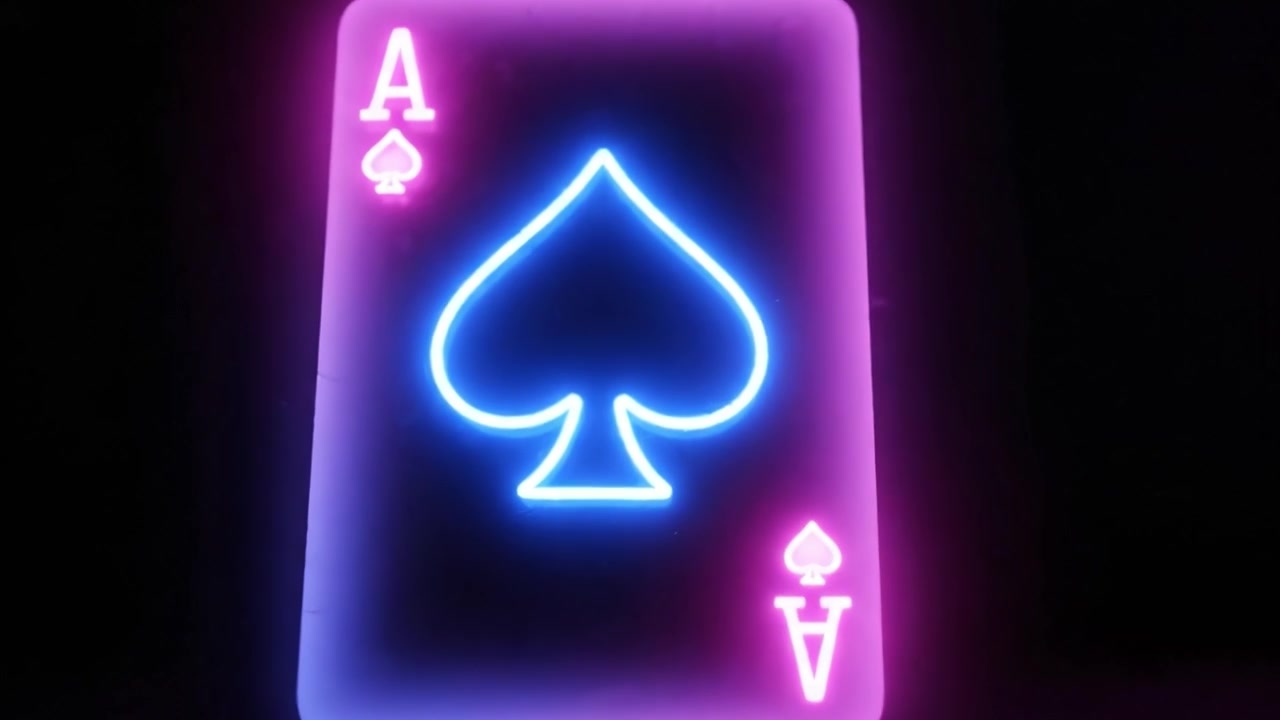 A Stunning Neon Glow of the Ace of Spades Playing Card Captured in Two Frames, Showcasing Its Radiant Design Against a Dark Background