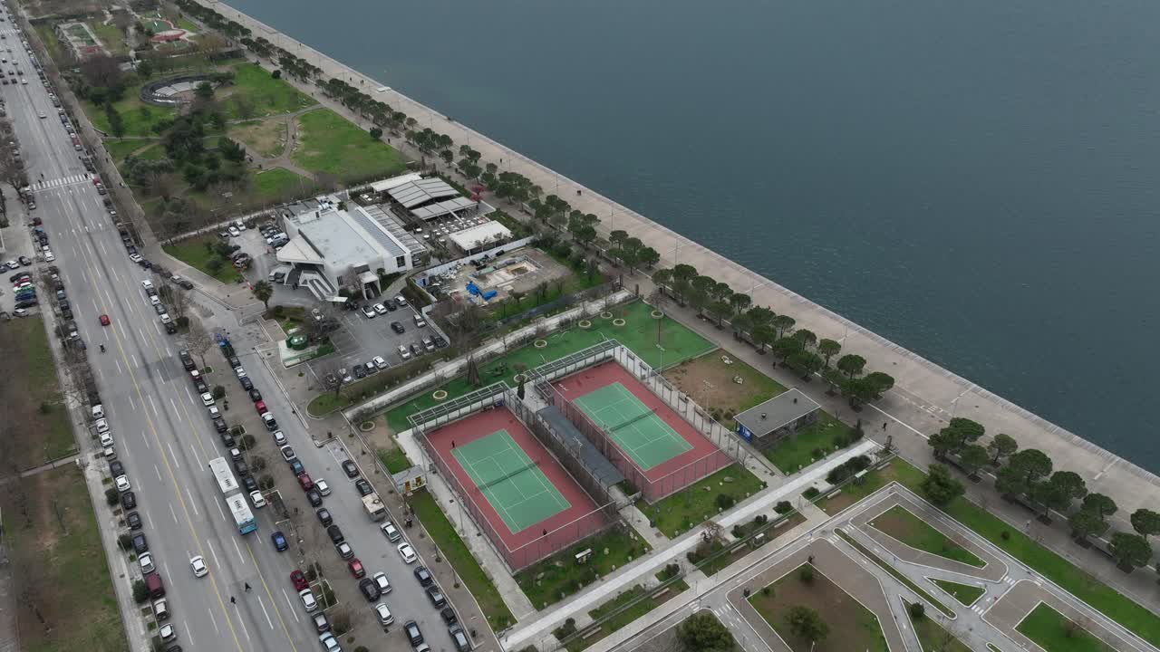 Tennis courts by the sea in Thessaloniki City, showcasing a peaceful outdoor setting