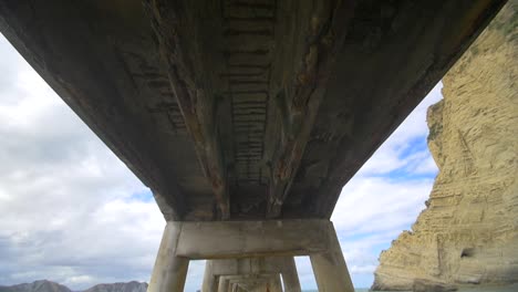 panning down under a wharf