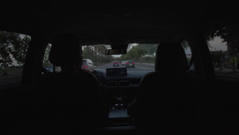 father and son are driving in a car