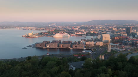 drone view from above ekebergparken over oslo bjorvika port district, oslofjord
