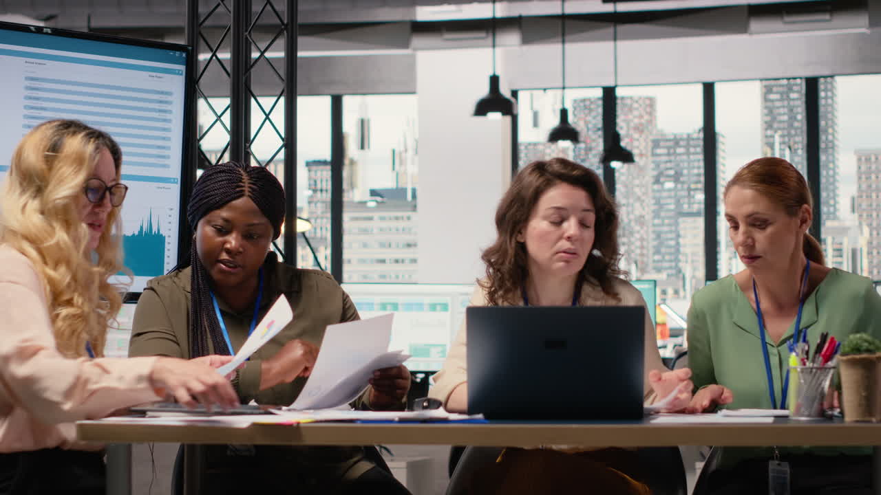 Vertical Video Multiethnic goals oriented team of women demonstrates the power of leadership