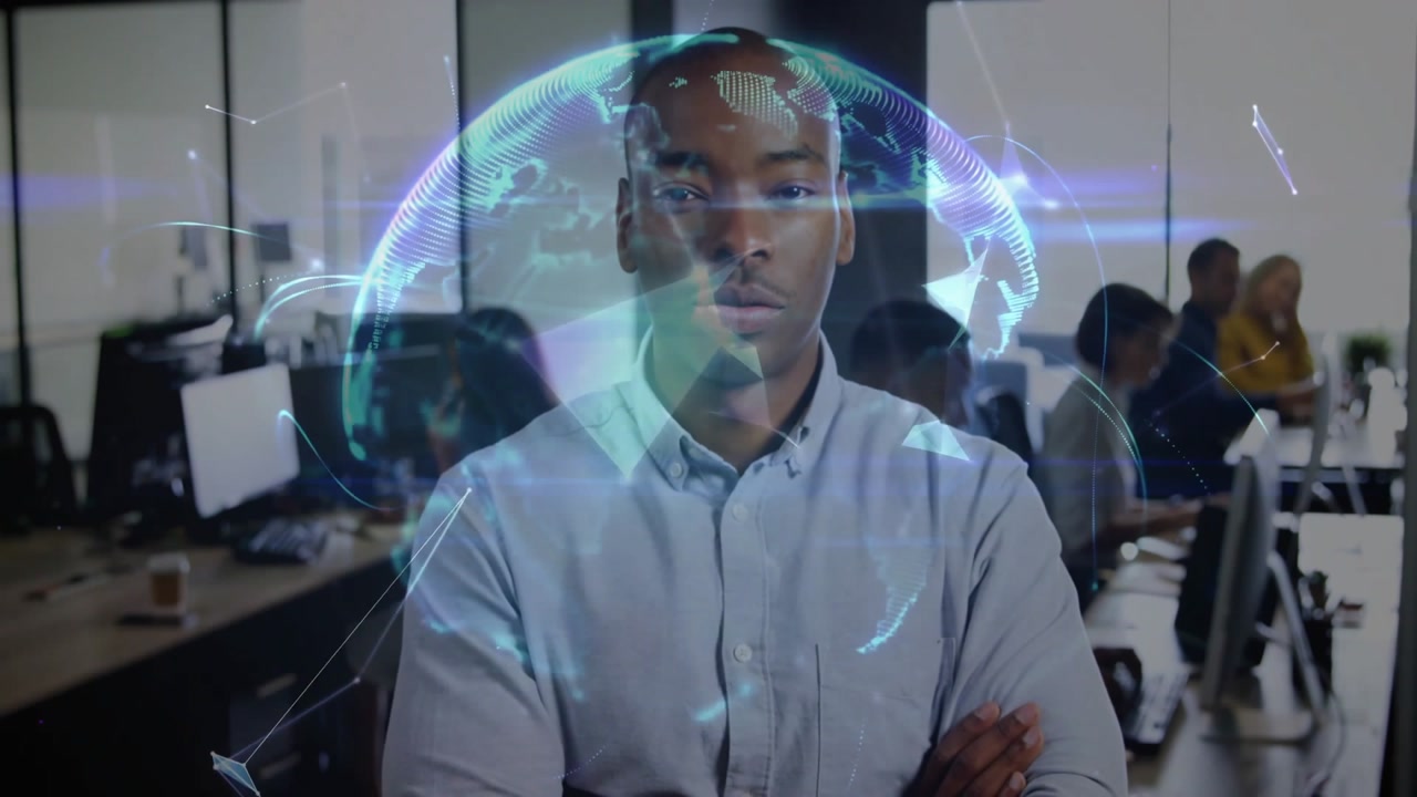 Standing man in tech office witnessing nodes drifting into rotating globe visualizing network