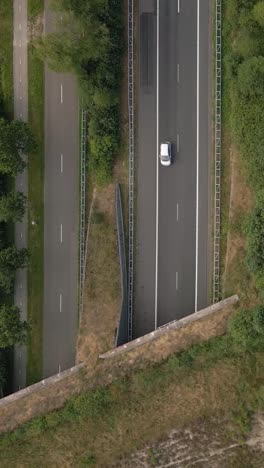 aerial view of highway intersections and vehicles