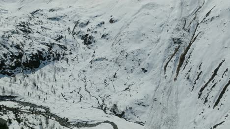 frozen creek near the kaunertal glacier in tyrol, austria