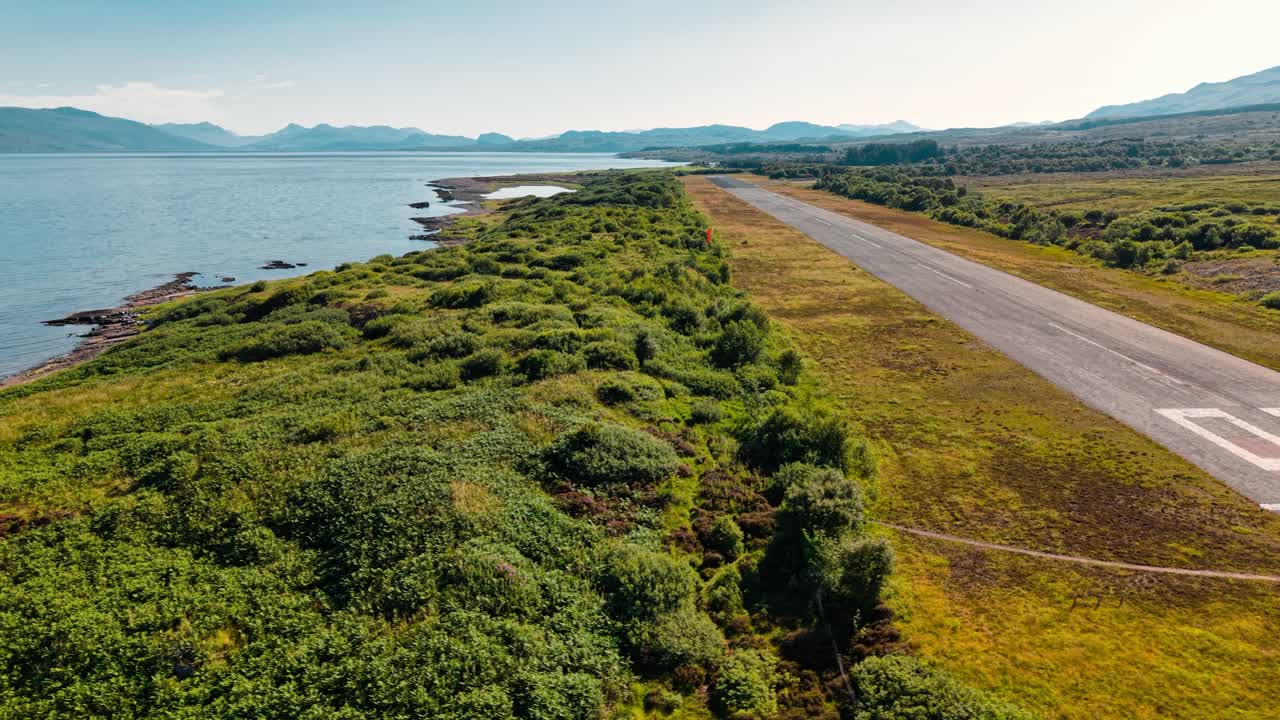 Aerial View of Airport Runway by the Coast