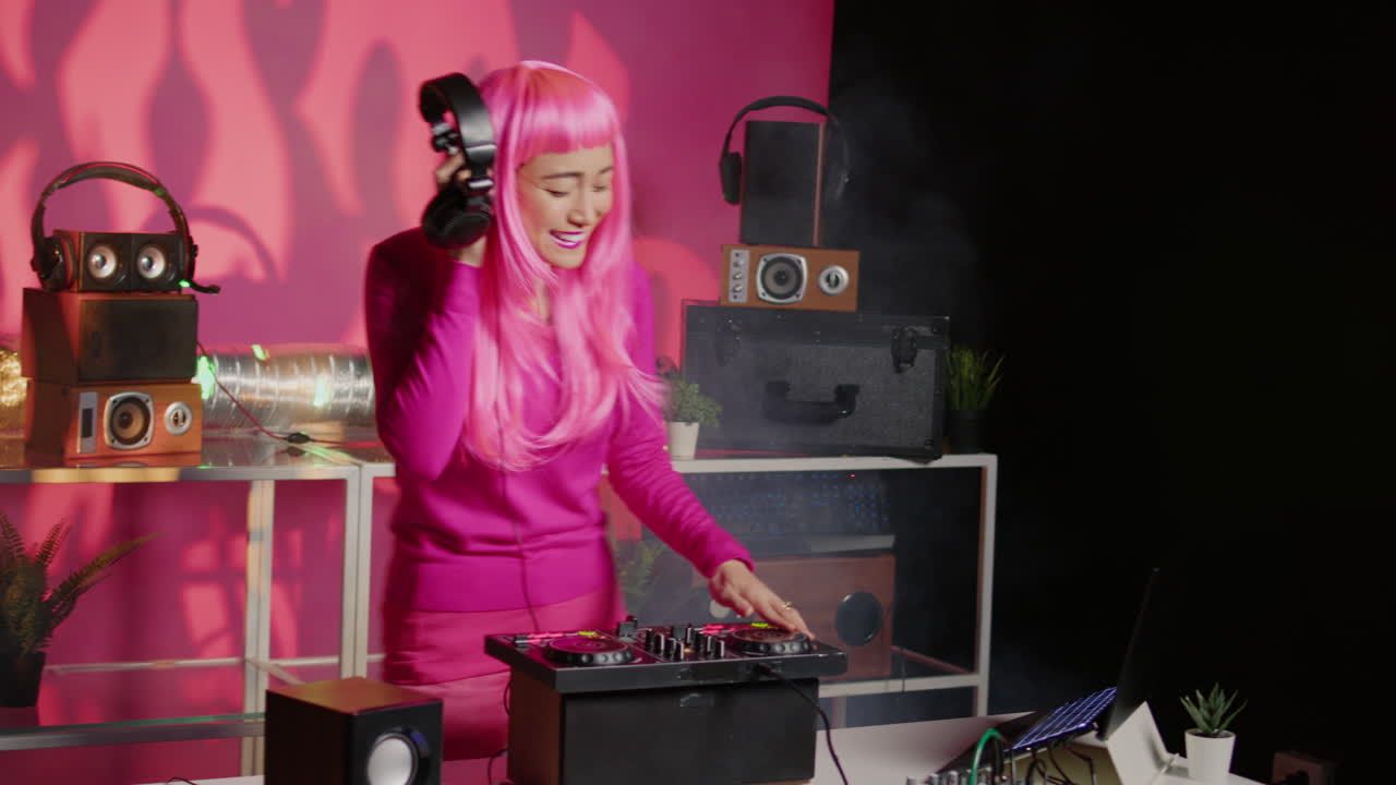 Woman DJ with Pink Hair Performing