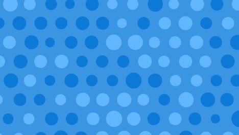 blue polka dots move on a light blue background.