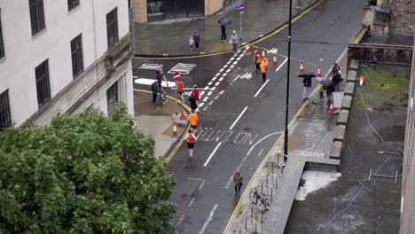 runners turning street corner in race