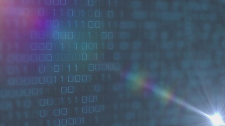 Hvit lysbluss dukker opp fra venstre kant og sender en regnbuestripe diagonalt over et binært rutenett som visualiserer data.