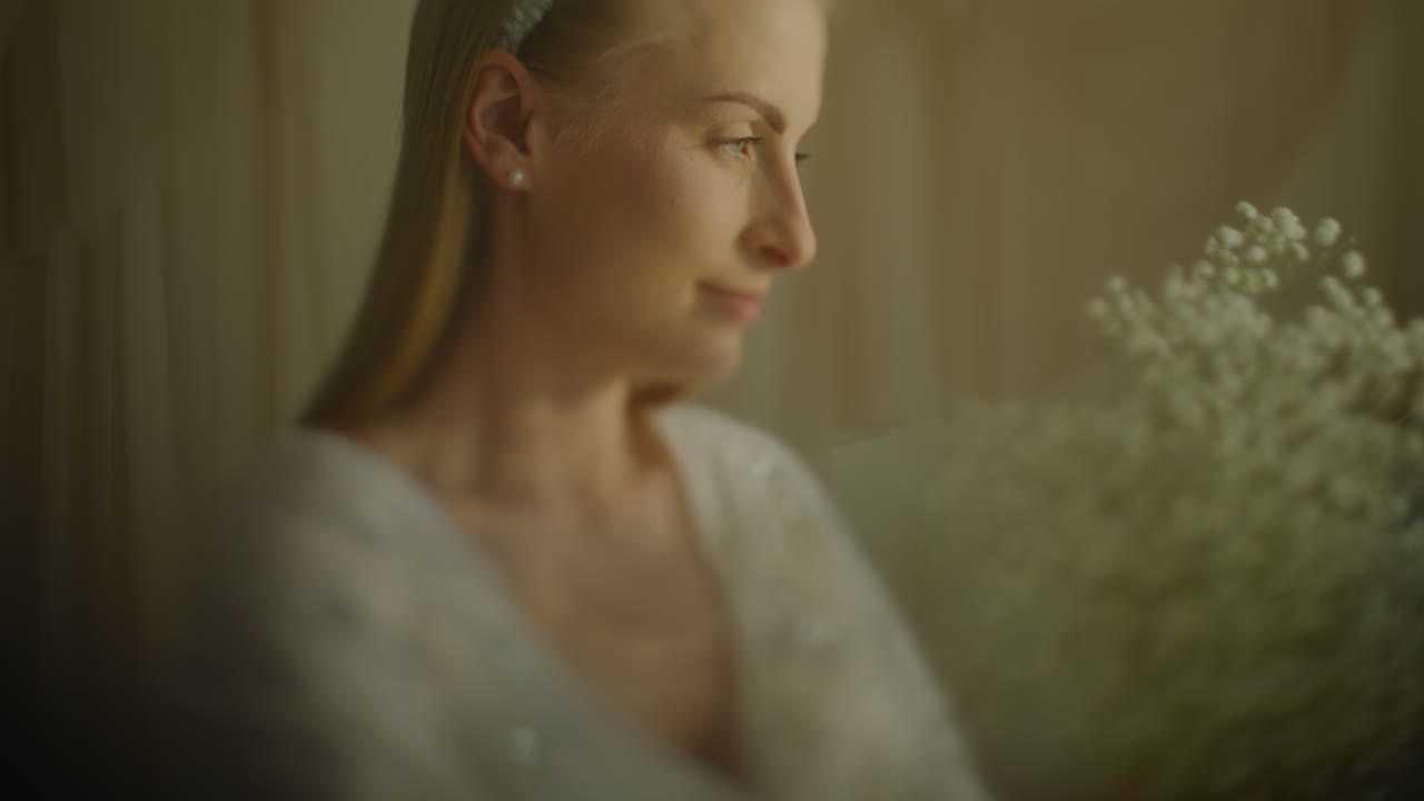 Portrait of Thoughtful Woman with Gypsophila Bouquet