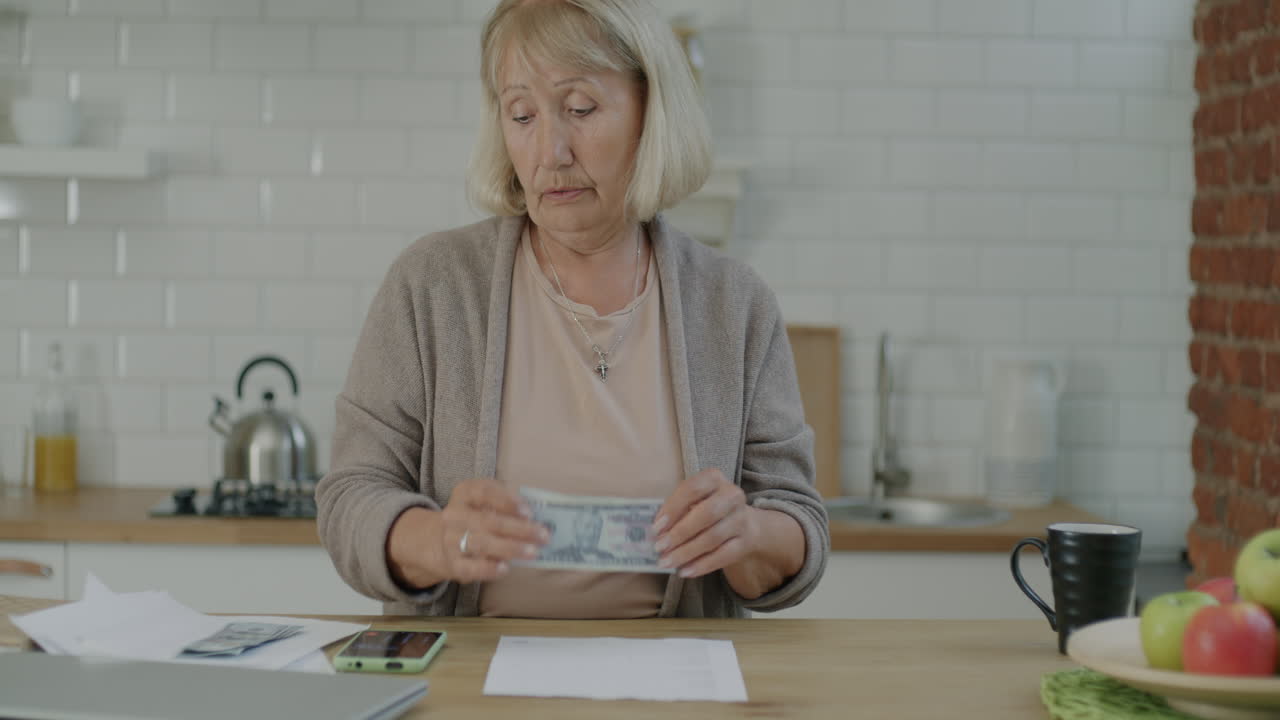 Senior Woman Managing Finances at Home