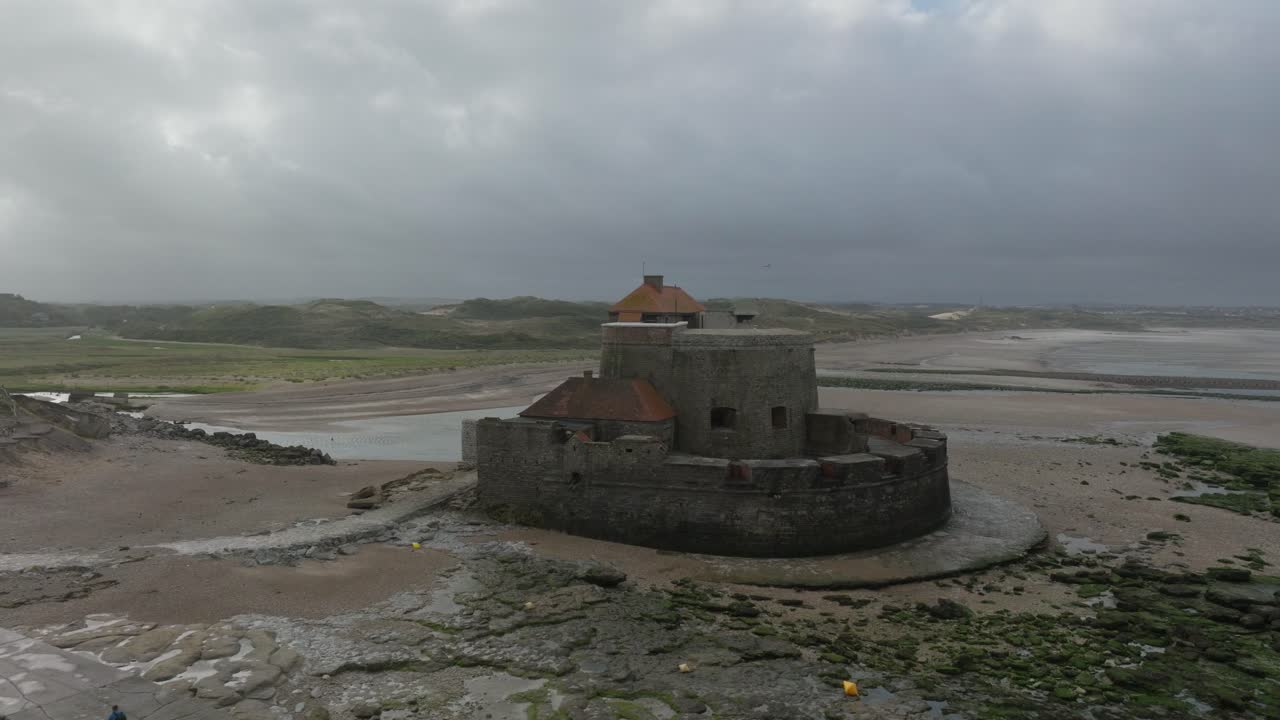 Drone shot of Fort d'Ambleteuse during low tide on a windy summer day