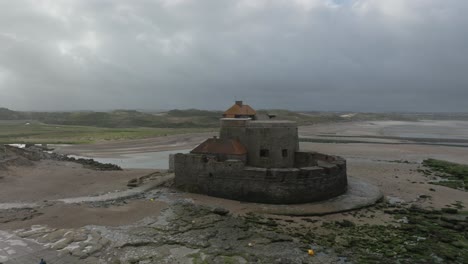 drone shot of fort d'ambleteuse during low tide on a windy summer day