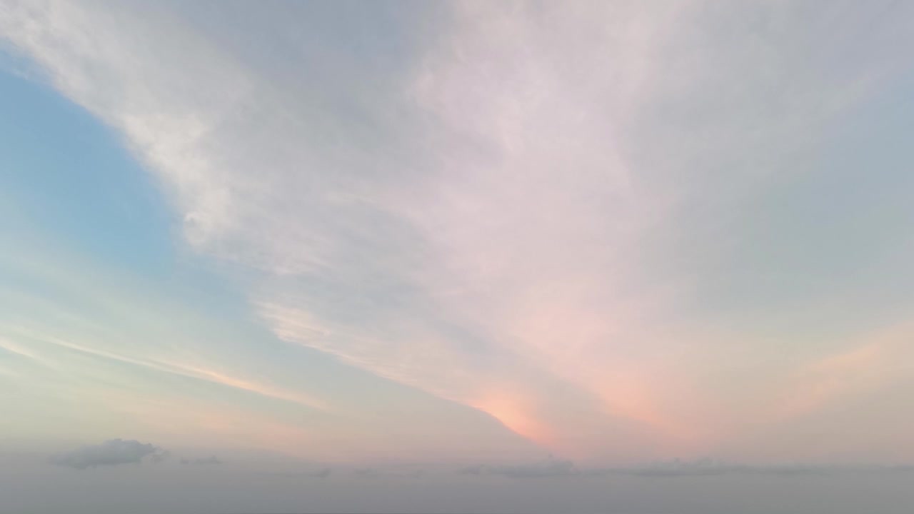 Soft Pastel Sunset Sky with Wispy Clouds