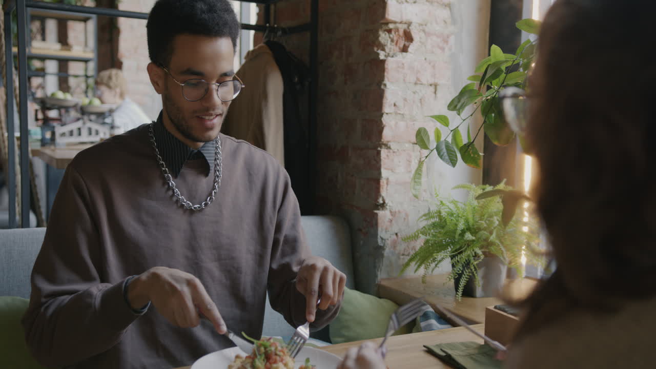 Couple Eating Lunch in a Cafe