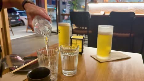 beverages being served at a dining table