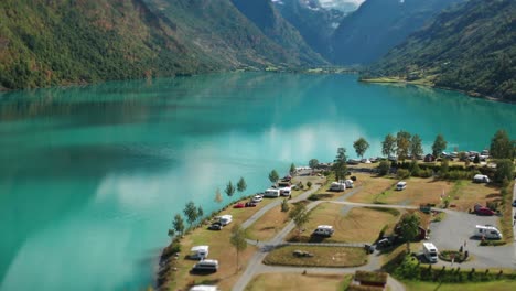 Revealing-shot-of-a-Jostedalsbreen-gacier-over-a-Gryta-camping-in-Norway