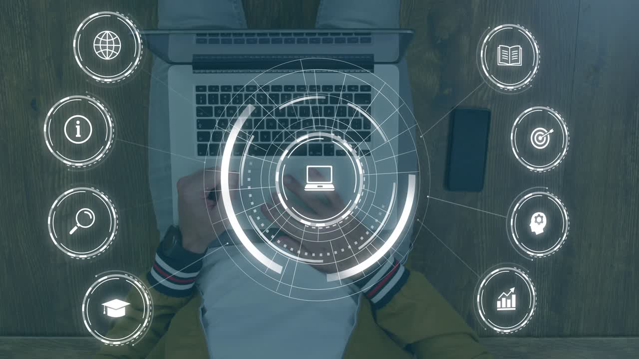 Man placing phone on desk, HUD centering laptop and linking icons while typing, managing tech data