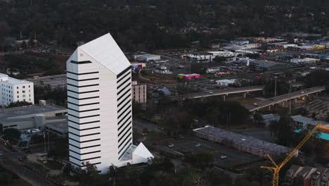 telephoto drone shot panning in front of buildings in downtown tallahassee, usa