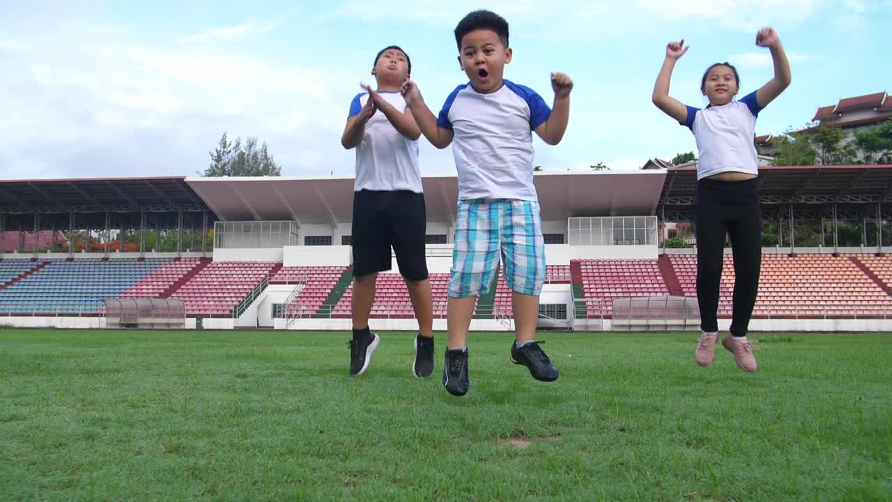 Kids Happy Jump At Stadium