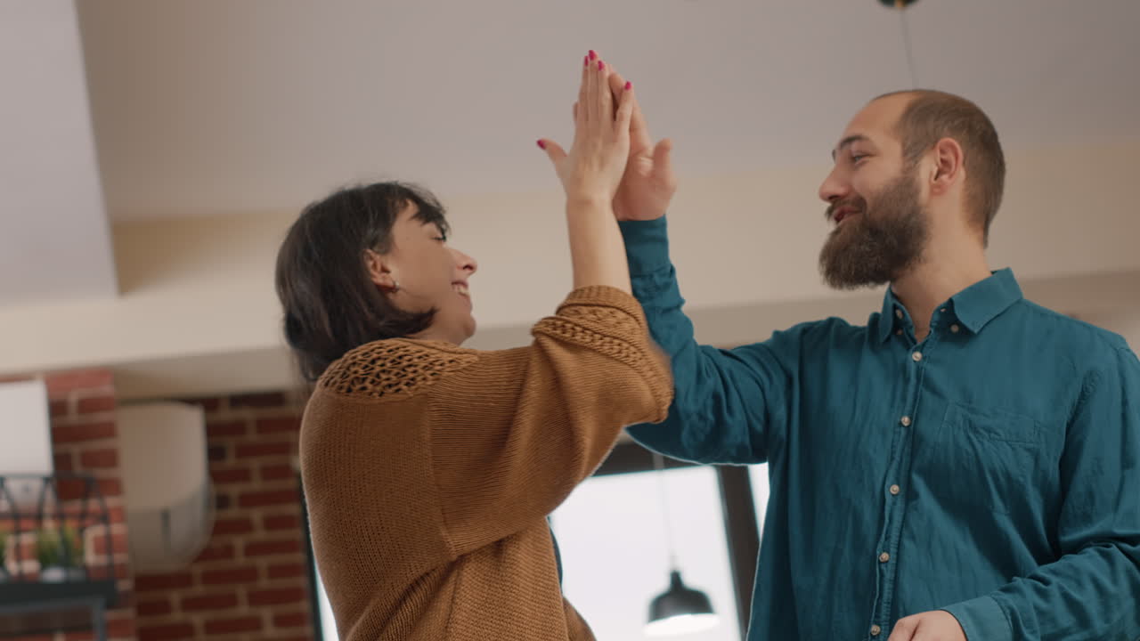 Business colleagues discussing a report indoors