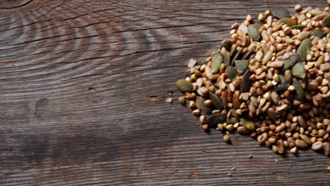 granola scattered on a wooden table 4k