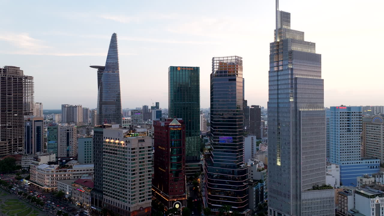 Aerial riser shot of iconic skyscrapers around Mê Linh Square, District 1, HCMC