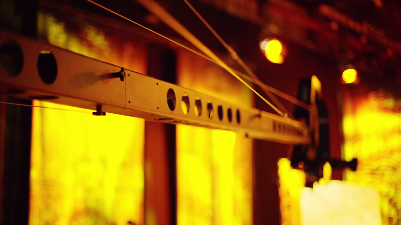 Professional long camera filming with on the backstage of a TV set