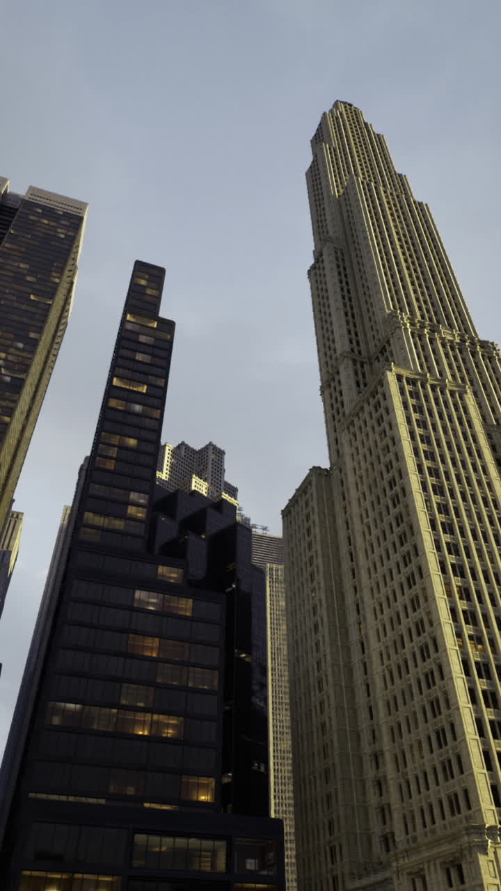 Urban skyscrapers reaching for the cloudy sky over a bustling cityscape
