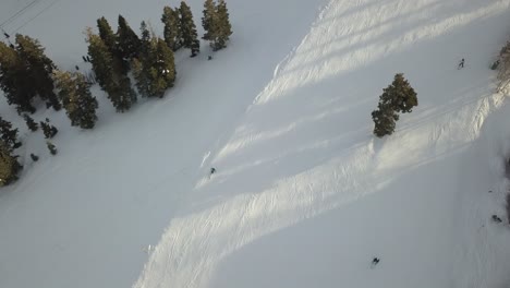 Aerial-of-a-Skier-on-a-Snowy-Mountain