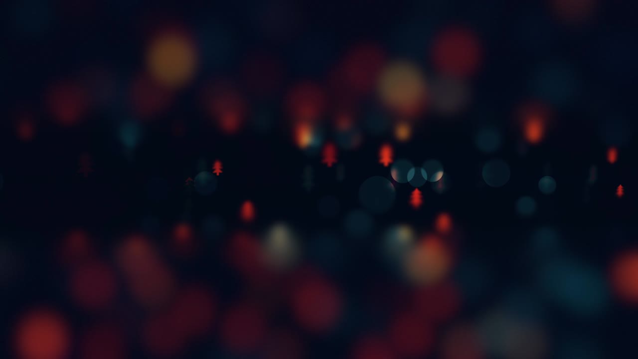 Slow motion of the blurred and glowing small christmas trees