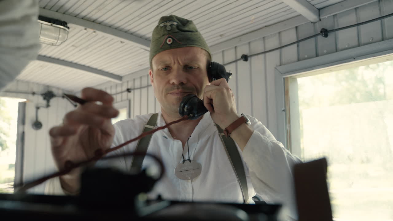 WWII Soldier on Train Phone Call