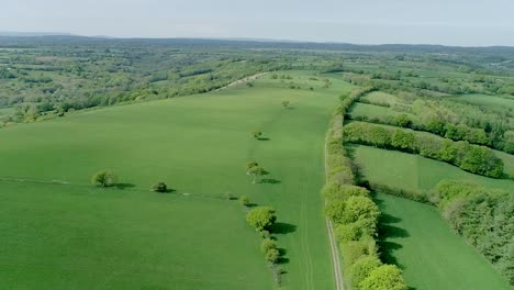 drone shot over a vast green region of wales, united kingdom