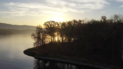 sunrise over a river island