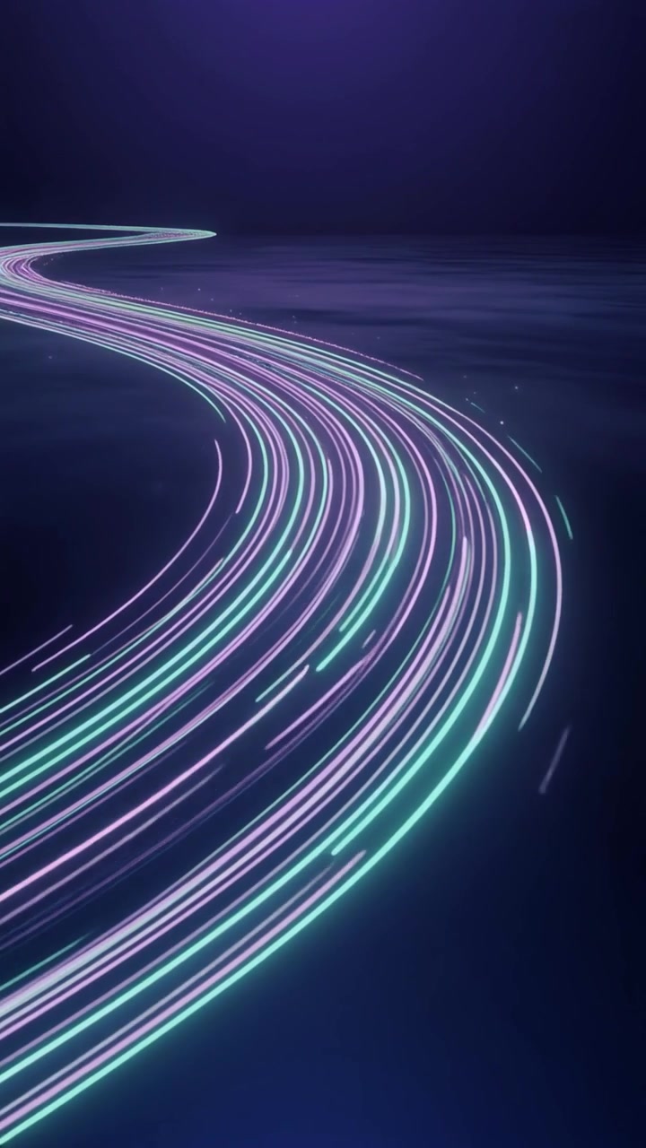 Movimento astratto di scie di luce al neon luminose nello spazio scuro
