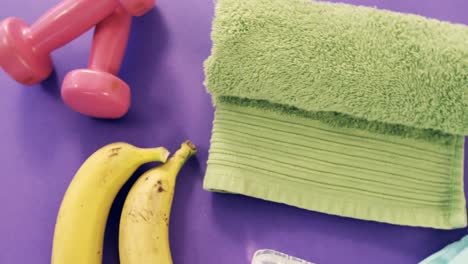 Banana,-napkin,-fitness-band,-dumbbells,-water-bottle-and-zipper