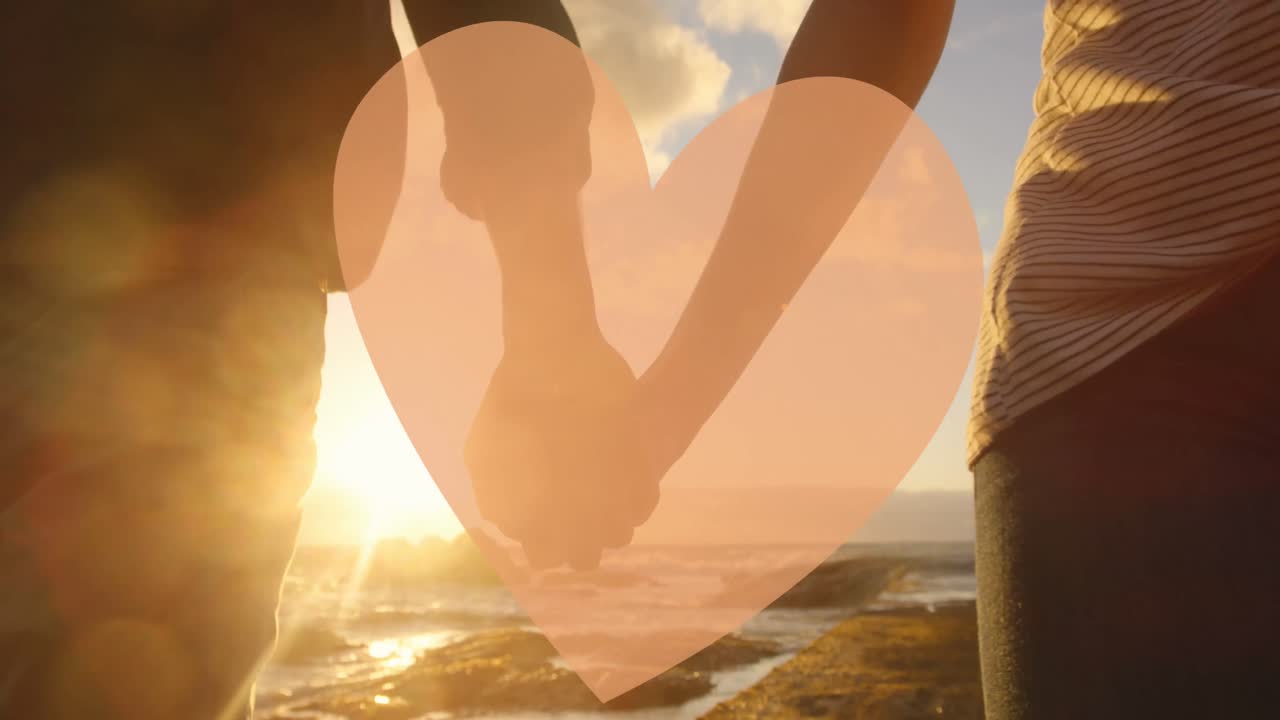 손을 잡고 있는 사람 들 위 에  ⁇ 은 심장 의 애니메이션