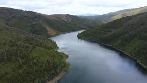 amazing drone view of river zêzere valleys on a cloudy sunny day