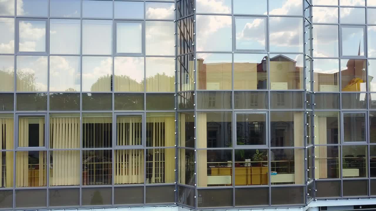 Modern Architecture Facade, Business Concept. Aerial shot of the windows at office skyscraper building