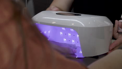 drying nails at a nail salon