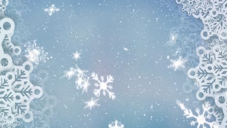 Animation-of-snowflakes-falling-on-blue-background